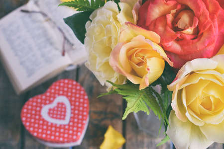 Bouquet of yellow and red roses. Flowers. Valentine or Wedding Theme. Romantic. Copy space.の写真素材