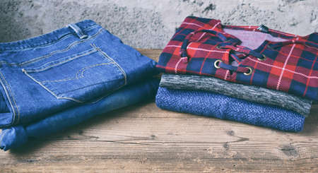 Men casual outfit. Men's shoes, clothing and accessories on wooden background - sweater, jeans. Top...