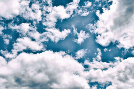 The beautiful blue sky background with tiny clouds.