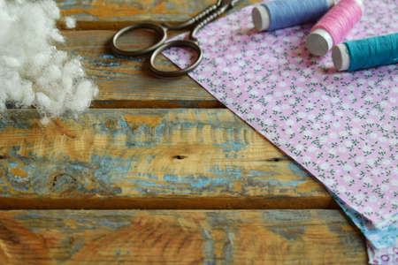 The equipment for sew toys from textile with your own hands. Tissue, synthetic winterizer, threads,...