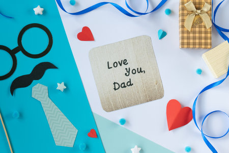 Love you dad card with paper tie mustache shirt gift box red heart on blue and white background flat...