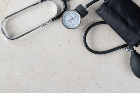 Blood pressure monitor and stethoscope on white background. Healthcare and diagnosis concept focused...