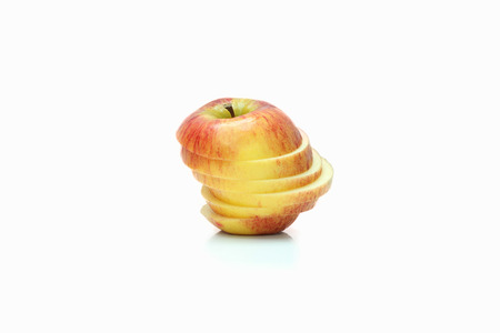 Sliced red Apple on the white backgroundの写真素材