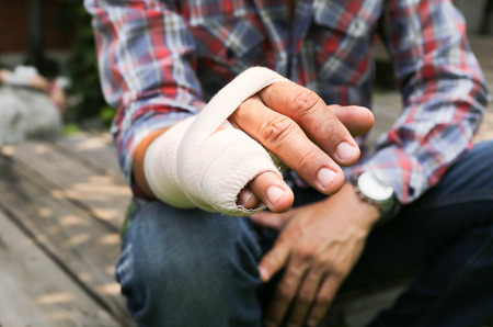 Splint broken bone  hand Injured in blur backgroundの写真素材