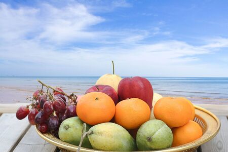 Fresh fruit and tropical beach in Hua Hin Thailandの写真素材