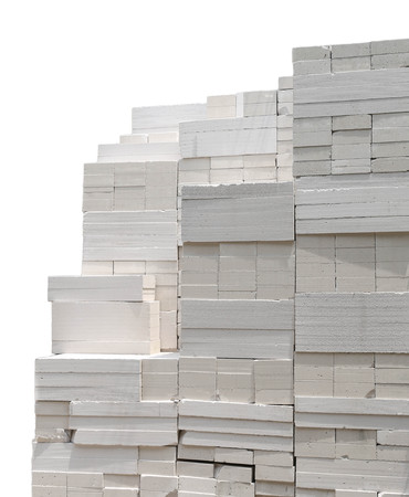 Stack of  white bricks  for construction building isolated on white backgroundの写真素材