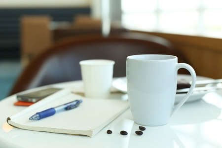 Coffee with blank paper note and penの写真素材