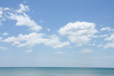 Tropical sea with blue sky and white cloud in summer timeの写真素材