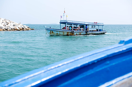 Group of tourists traveling by fishing tail boat in Thailandの写真素材