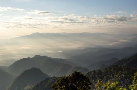 Sunrise on Fog and cloud mountain valley landscape in black and whiteの写真素材