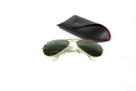 Sunglasses with case isolated on white background.