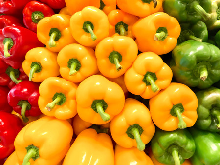 Colorful of bell peppers in natural background texture patternの写真素材