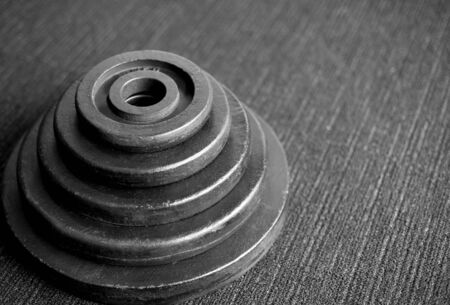 Fitness exercise equipment dumbbell weights in black and whiteの写真素材