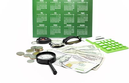 Business and finance concept dollar bank note and thai coins and accessory in white background.の写真素材