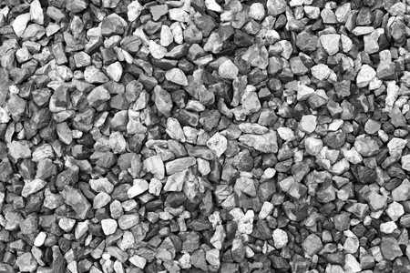 Crushed grey stone in black and white back ground texture