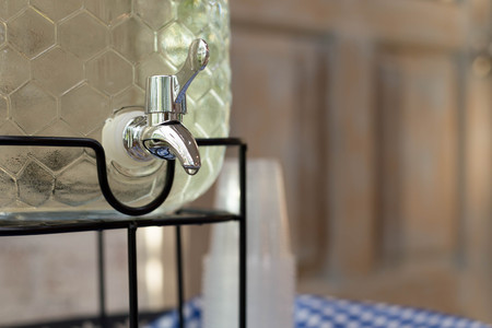 Cold water dispensers with water droplet on stainless steel cooler valveの写真素材