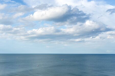 Top view cloud scape and ocean with fishing boat in Thailandの写真素材