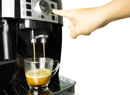 Hand press coffee machine making cup of coffee isolated in white backgroundの写真素材