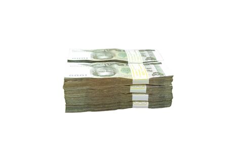 Pile of Thai baht bank notes Isolated on white background