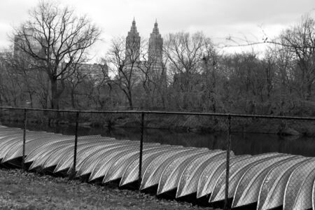 New York City Manhattan Central Park with boat next to the fence in winter time black and whiteのeditorial素材