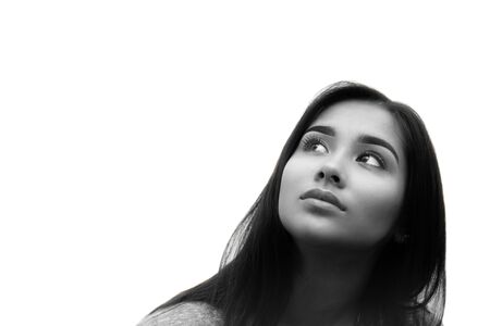 Black and white beautiful mixed race young woman face isolated in white backgroundの写真素材