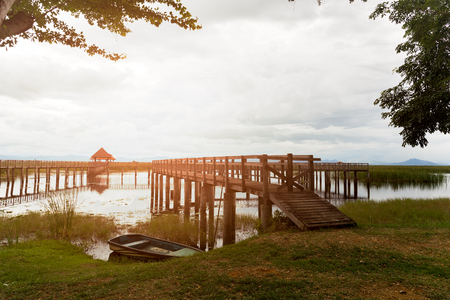 Sunlight over the lake in Sam Roi Yod National Park Pran Buri Thailand view from a wooden bridgeの写真素材