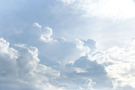 White clouds background texture pattern with sunlightの写真素材