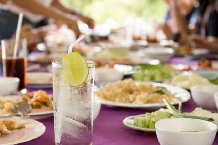 Healthy nutrition of drinking water with lime on the tableの写真素材