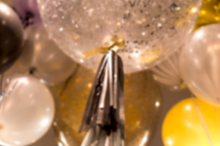 Blurred concept background group of balloon with sparkles and shot in high iso with low lightの写真素材