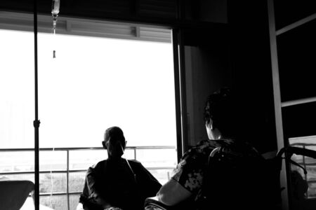Silhouette concept true love wife visiting husband in Hospital in black and whiteの写真素材