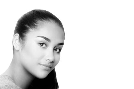 Black and white beautiful mixed race young woman face isolated in white backgroundの写真素材