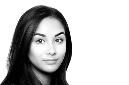 Black and white beautiful mixed race young woman face isolated in white backgroundの写真素材