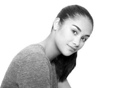 Black and white beautiful mixed race young woman face isolated in white backgroundの写真素材