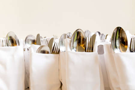 Hotel restaurant napkin mock fork and spoon in napkin setの写真素材