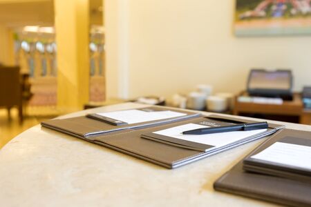 Pen and application form on the of marble tableの写真素材