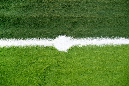 Soccer field with center spot on artificial grassの写真素材