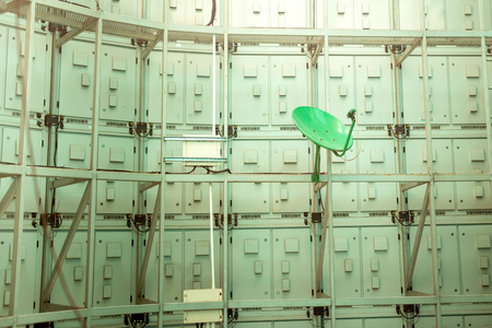 Green color satelite is attached to control panel wall sytemの写真素材