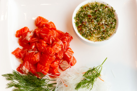 Salmon slices salad spicy sauce in thai styleの写真素材