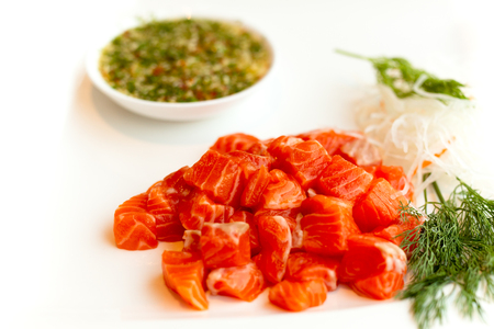 Salmon slices salad spicy sauce in thai styleの写真素材