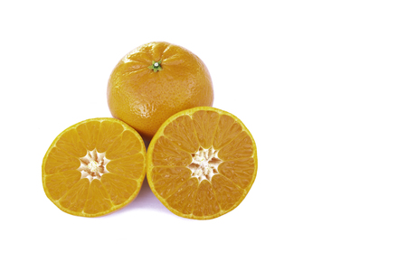 Orange with half of orange isolated on the white background in clipping pathの写真素材