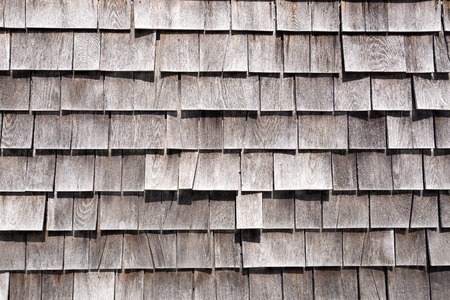 Wooden roof grey shingles textured background pattern.の写真素材