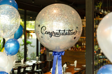 Balloons with word Congratulation on ballon decoration in the rsetaurant.の写真素材