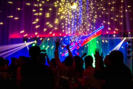 Shot in low light blurred concept night scene in concert party wの写真素材
