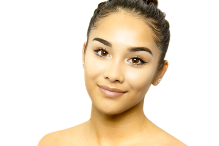 Mixed race young woman face portrait isolated on whiteの写真素材