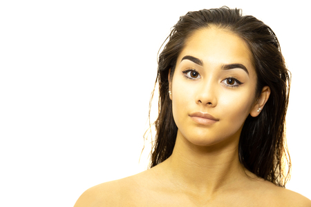 Portrait mixed race young woman face isolated on white backgroun.の写真素材