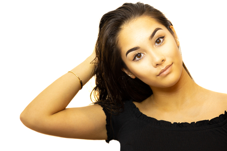 Portrait mixed race young woman face isolated on white backgroun.の写真素材
