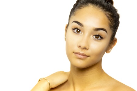 Mixed race young woman face portrait isolated on whiteの写真素材