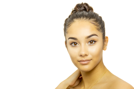 Mixed race young woman face portrait isolated on whiteの写真素材