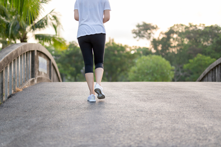 Woman exercise walking in the park in morning.の写真素材