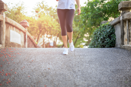 Woman exercise walking in the park in morning.の写真素材